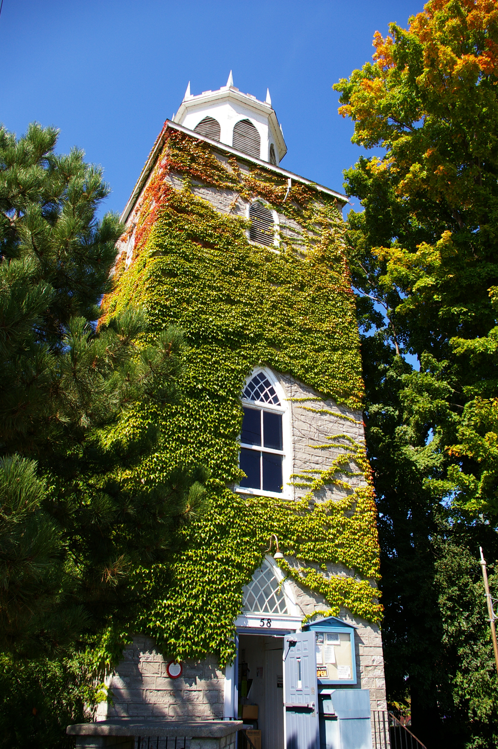 Holy Trinity Anglican Church, built in1847 in Consecon, Prince Edward County.  In 1978 it started its second life as a branch of the Public Library.