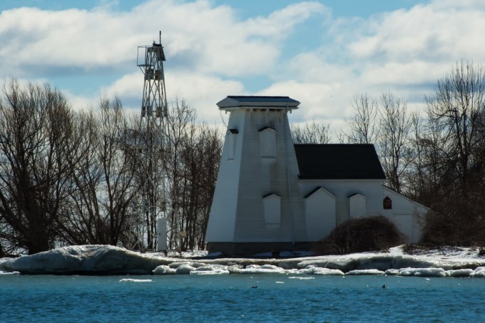 Closeup of the lighthouse - old structure on the right, metal one on the left.